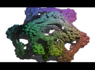 A foggy pseudo-octonionic Julia set ('MandelBulb' like: a 'JuliaBulb')computed with A=(-0.581514...,+0.635888...,0,0,0,0,0,0) and with a rotation about the X axis -tridimensional cross-section- 